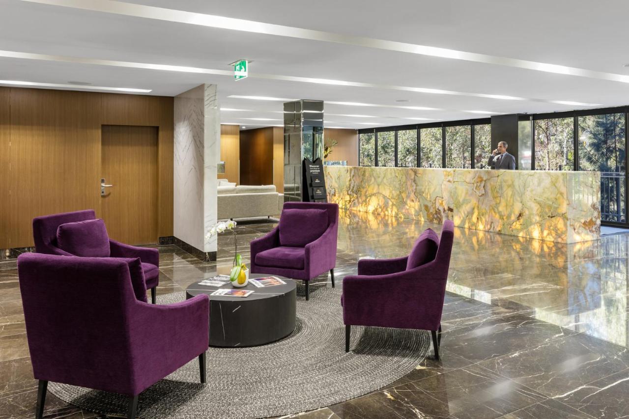 Meriton Suites North Ryde Sídney Exterior foto Lobby